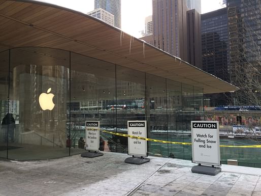 Caution signs around Apple's Chicago flagship store. Photo: Matt Maldre.