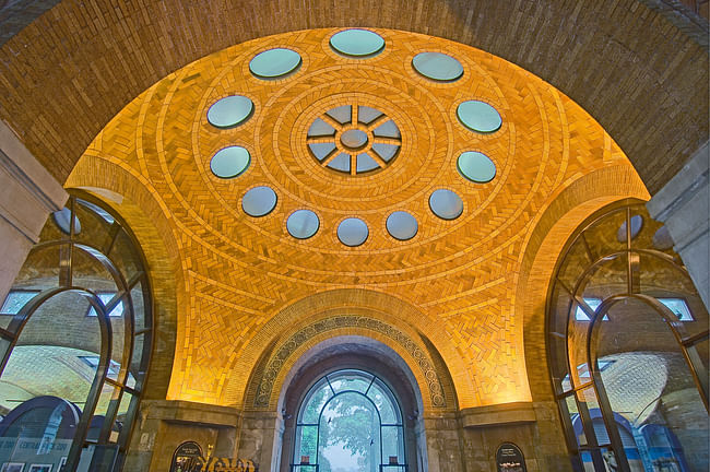 Guastavino's arrival in the U.S. coincided with the dawn of a fertile period in American architecture and a huge construction boom in New York. As a result, cultural organizations were comissioning leading architects to design iconic structures that would become symbols of their institutions. One such example is the Elephant House at the Bronx Zoo, designed by architectural firm Heins and LaFarge, with a Guastavino Company vaulted interior finish of herringbone tile seperated by horizontal...
