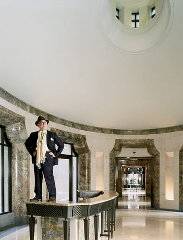 Robert A.M. Stern Robert A. M. Stern stands on the concierge desk at 15 Central Park West by Todd Eberle (for Vanity Fair)