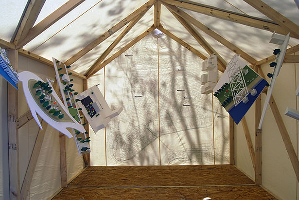 The interior of one of our prototype tents, including several models.