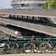 Amsterdam has an extensive network of bicycle infrastructure, such as this 3-story bike parking lot at Centraal train station. Credit: Wikipedia