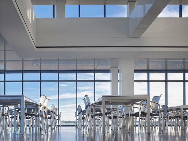 The south dining area is raised providing an amazing view to downtown. 180º views and clerestory glass reinforce the idea of being in the clouds.