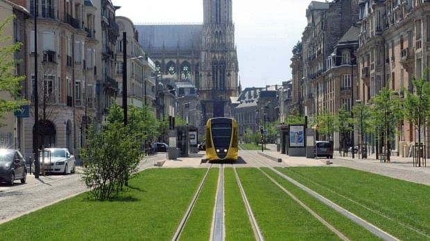 The tramway in Reims, with the cathedral in the background. Photo: Richez Associes Read more: http://www.smh.com.au/nsw/sydneys-light-rail-renowned-french-architect-thomas-richez-to-advise-on-design-20150727-gildif.html#ixzz3hDoLg1PL
