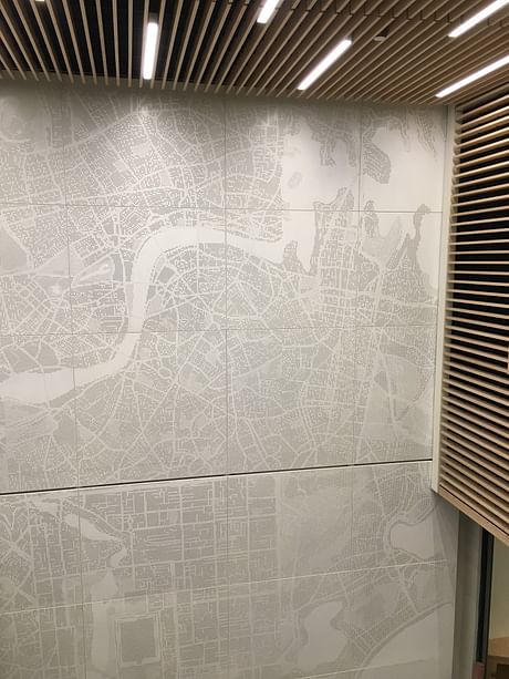 Custom metal panel wall - wall of maps