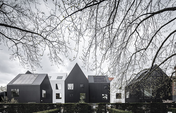 The kindergarten's multi-structured sihloette mirrors the dwellings that line the streets of Copenhagen's Frederiksberg neighborhood.