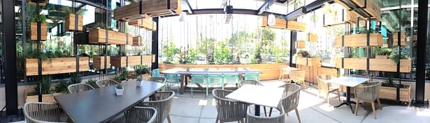 Interior view of trellis patio dining area.