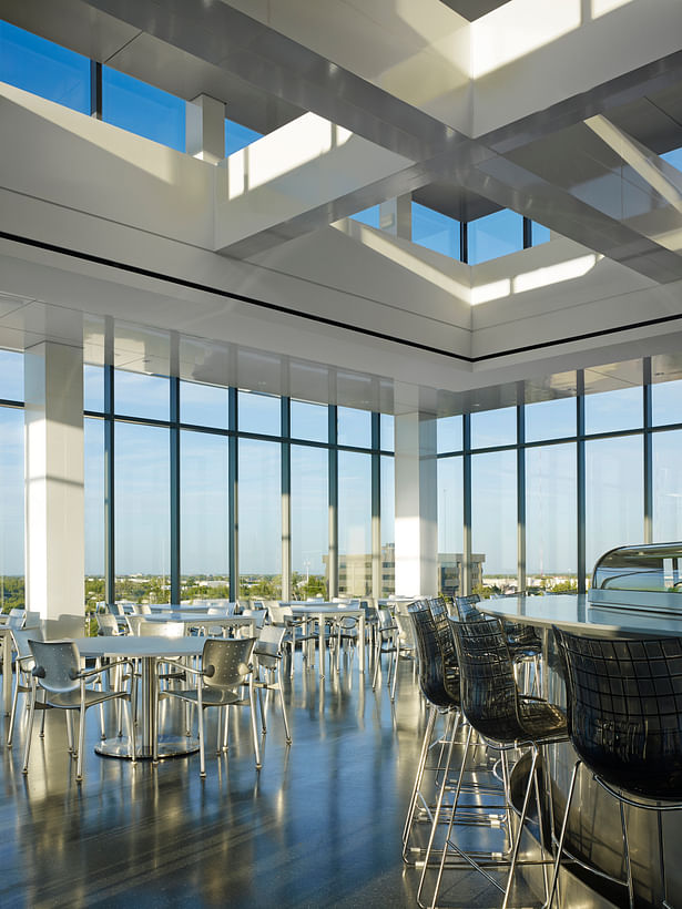 The north dining space is the sushi bar. The stainless steel bar, terrazzo floors and white glass cladding create a crisp, fresh atmosphere.