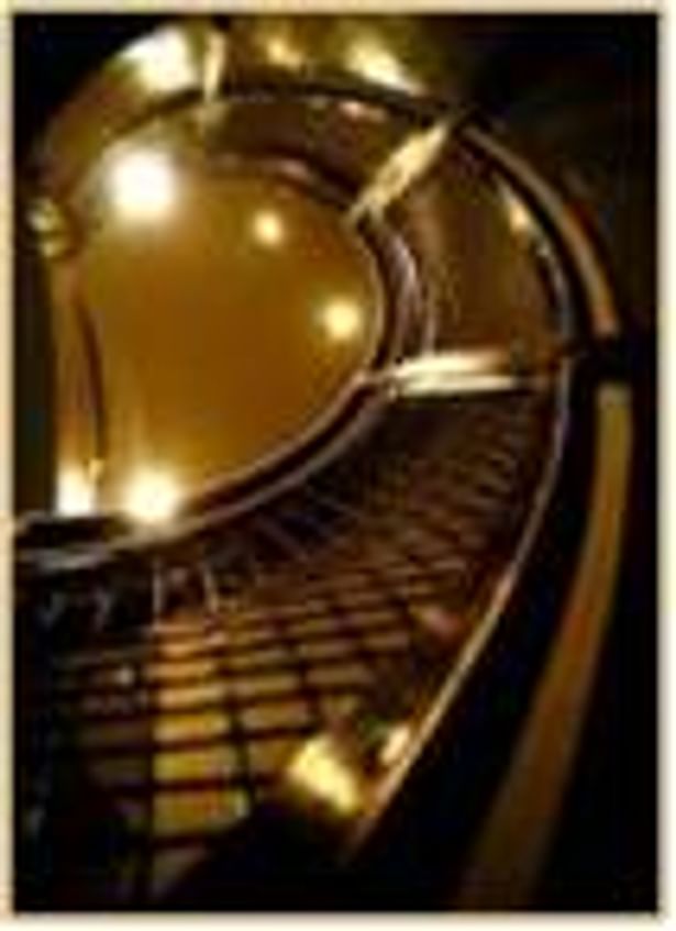 Interior picture of spiral stainless steel stair.