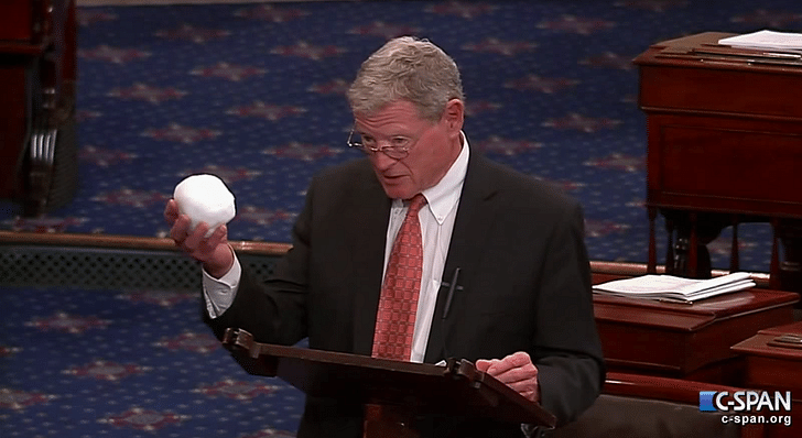 Senator Jim Inhofe brandishes a snowball during a Congressional session as evidence for his argument that climate change is a hoax. Credit: CSPAN via Youtube