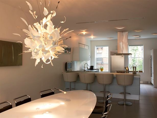Valcucine classic white kitchen with Ingo Maurer chandelier and custom designed dining room table