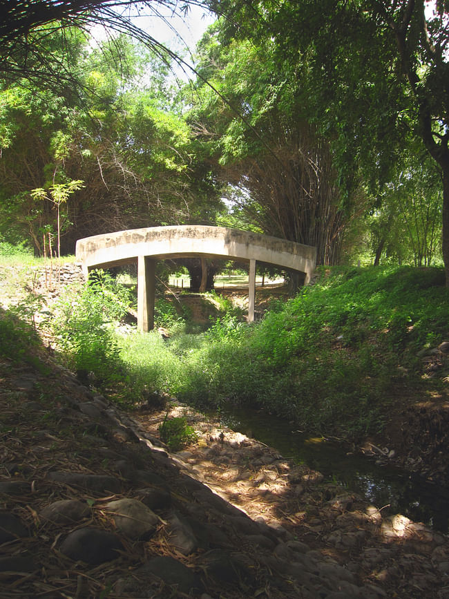 A tiny stream cuts through the entire city creating its green belt