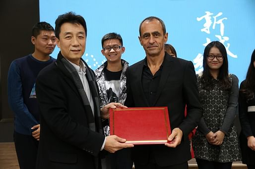 (Front row, left to right) Weimin Zhuang, Dean of School of Architecture at Tsinghua University, Beijing, China, and Keith Griffiths, Chairman of Aedas