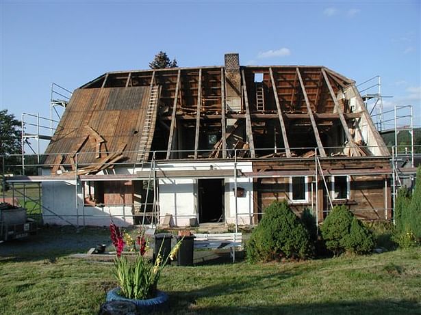 removing roof boarding to restore partially damaged roof structure