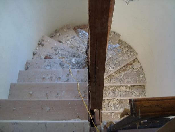 Before: Wall on second floor removed to open up stairwell.