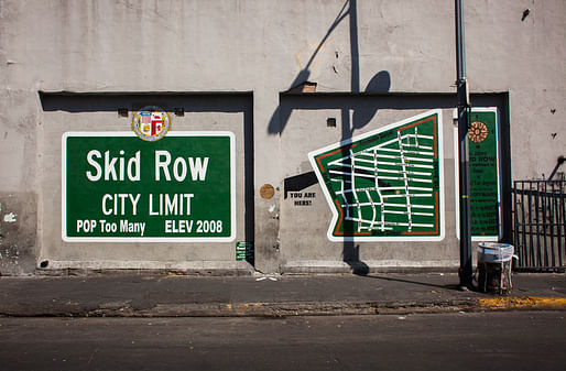 A mural in Skid Row, an area of LA that has traditionally been home for much of the city's homeless population but which is currently gentrifying. Image via wikimedia.org