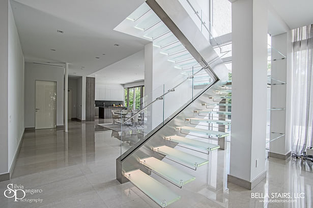 Our Cantilevered Staircase Design Features Frosted Glass Treads with LED Lighting!
