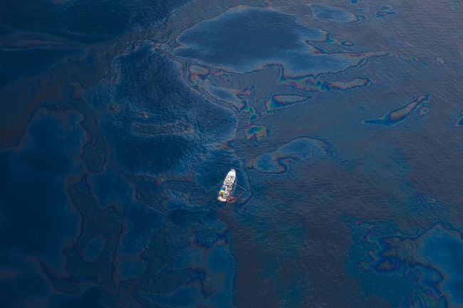 Oil from Deepwater Horizon coats the surface of the water of the Gulf of Mexico. Image via wikimedia