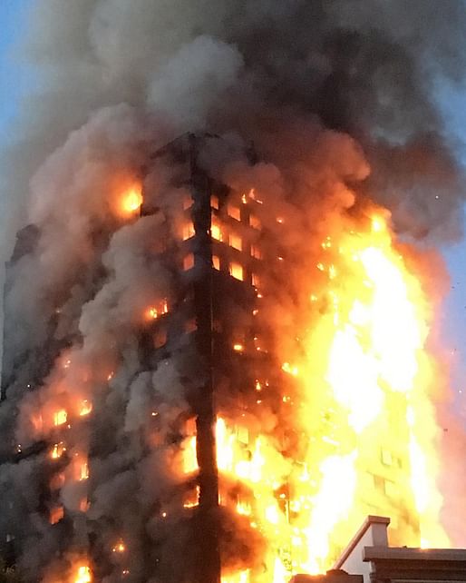 The 24-story Grenfell Tower completely engulfed in flames as the sun rises over London on Wednesday morning. Image via @mrgeorgeclarke on Instagram.