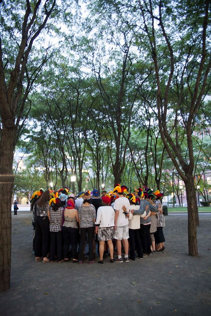 At sundown, nearly 100 members of the public gathered in Metrotech Plaza for the climax of the penultimate day of 'When I Left the House it Was Still Dark' in New York City, in 2013. Scene choreographed by Jen Harmon and organized by Ariel Abrahams. Photograph by Ayden L.M. Grout.