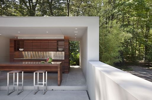 Outdoor kitchen in New Canaan Residence by Specht Harpman