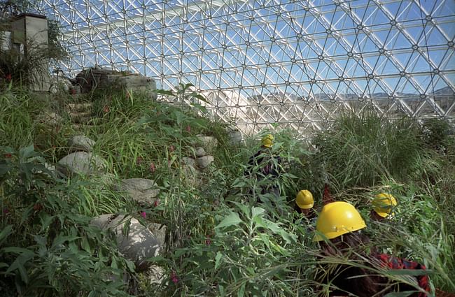 Pictures of the construction and setup of Biosphere 2, a compound intended to function as a self-sustaining ark for human life.This privately funded scale model of planet earth (Biosphere 1) was an ecological experiment, but it also explored the possibility of human colonies in outer space.The pictures were taken before the first closed mission began in 1991, when 4 women and 4 men walked through the airlocks and sealed themselves off for two years.The inhabitants were soon plagued by food...