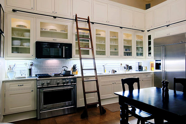 Finished kitchen with library ladder