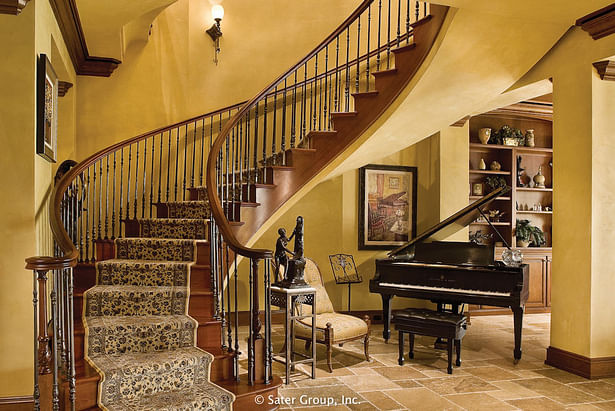 Right off the main foyer is the elegant curved stair case. Staircase that floats 4 inches.