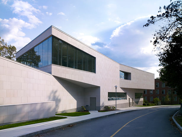 View of west facade on approach road to Theater Center 