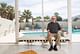 Donald Wexler inside the Wexler & Harrison-designed Steel House Development No. 2. in March 2015. | Photo credit: Submitted photo from Ann Johansson, via desertsun.com 