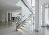 Floating Glass Staircase with LED Lighting