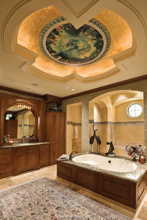The master suite bath room is stunning with it's hand painted ceiling mural, large central soaking tub, and the walk-in shower.