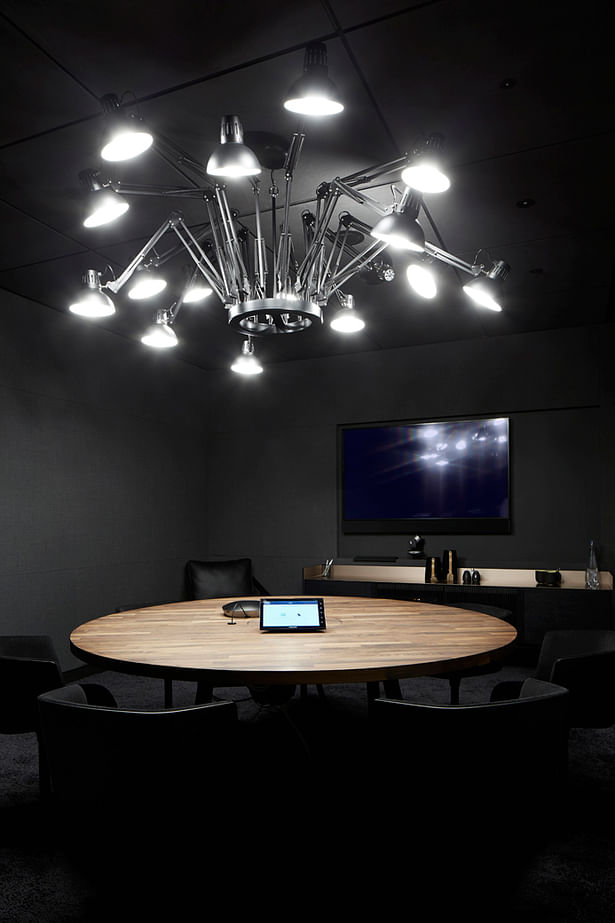 Private meeting rooms with contemporary lighting