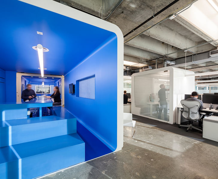 Freestanding, prefabricated office ‘PODS’ at the Clear Channel offices in Boston. Photo courtesy of Magda Biernat.