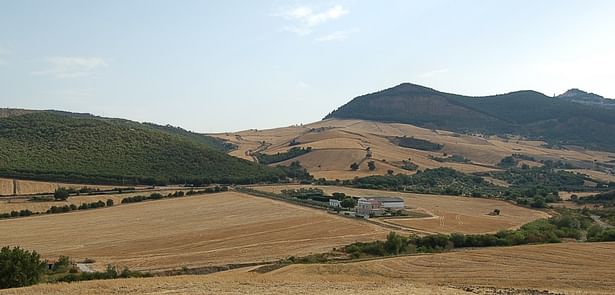 Landscape of the Apple valley with differents builts near the ancient farm before