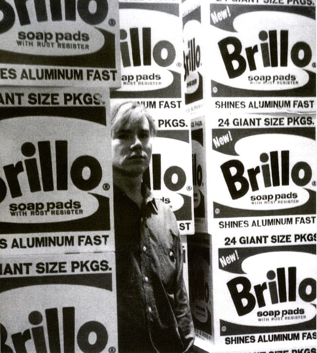 Warhol and his Brillo pads. Image via artepedrodacruz.files.wordpress.com.