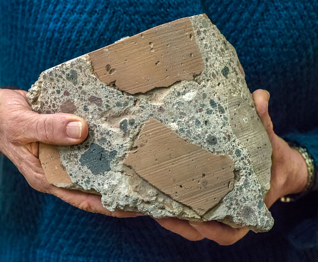 Ancient Roman concrete consists of coarse chunks of volcanic tuff and brick bound together by a volcanic ash-lime mortar that resists microcracking, a key to its longevity and endurance. (Photo by Roy Kaltschmidt, Berkeley Lab)