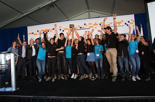 The Swiss Team celebrates its first place award in the Water Contest, 61st & Peña Station, Denver, Colorado, October 12, 2017. Photo Credit: John De La Rosa/U.S. Department of Energy Solar Decathlon.