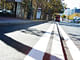 The beginnings of San Francisco's raised bikepaths. Credit: Ellie McCuthceon / SF Bicycle Coalition via Wired