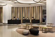 Aedas Interiors creates a minimal aesthetic with sculptural forms for Novotel Century Hong Kong’s high traffic lobby