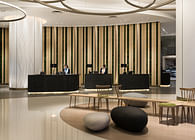 Aedas Interiors creates a minimal aesthetic with sculptural forms for Novotel Century Hong Kong’s high traffic lobby