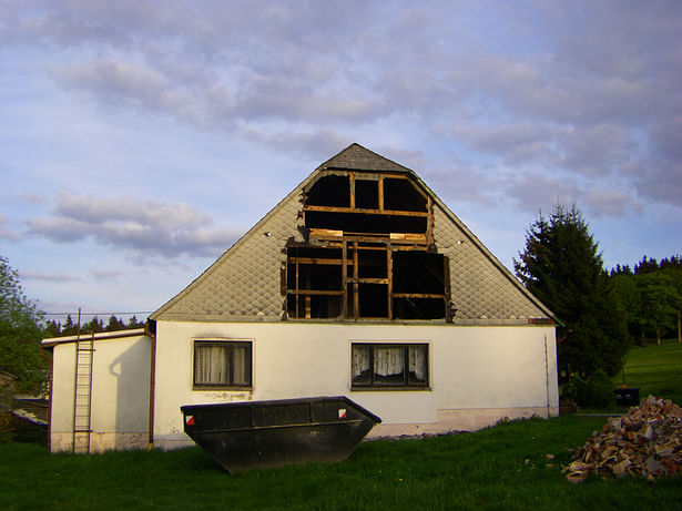 removing asbestos sheet-covered west-facade built in 1960