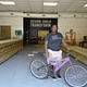 Studio H student Jamesha Thompson with a bike she built herself, with help from Studio H instructor Matthew Miller. From IF YOU BUILD IT, a Long Shot Factory Release 2013.