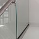 A stainless steel handrail was mounted directly onto the glass railings