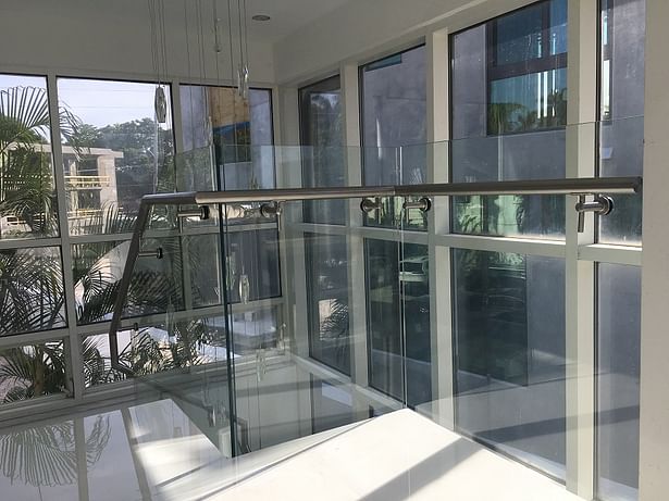 Glass Railings with a Stainless Steel Handrail