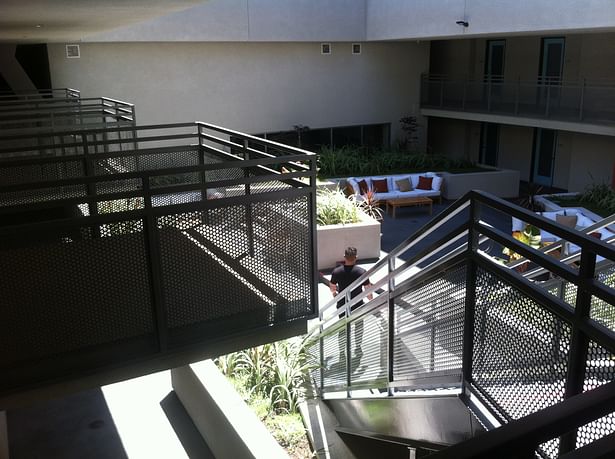 Private 2-level Balconies along new Courtyards.