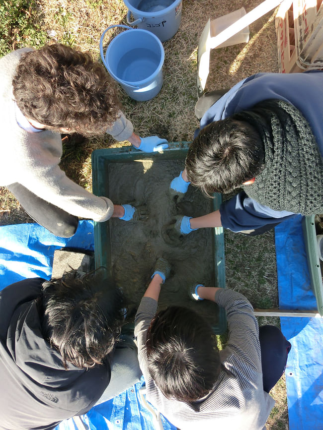 Testing concrete mixes at the Keio workshop. Courtesy of Bill Galloway