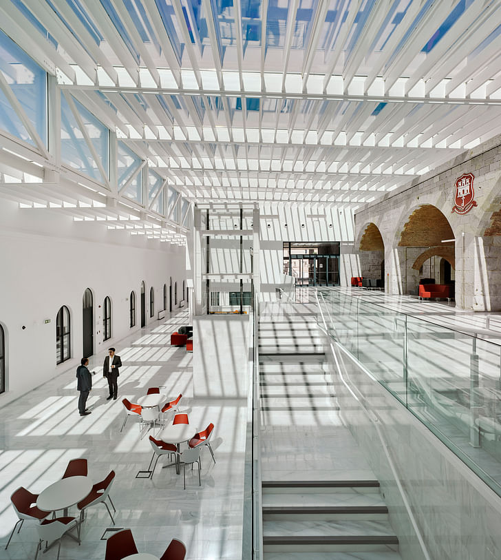 The atrium of Gibraltar University combines a mix of historical character and modern elements