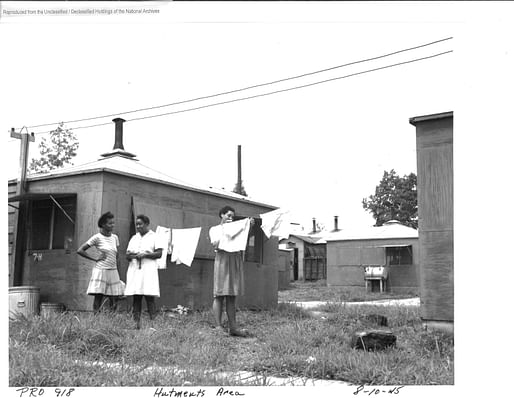 African American women hanging laundry in a hutment area, Oak Ridge, CA, 1945. Image: by Edward Westcott. National Archives and Records Administration. 