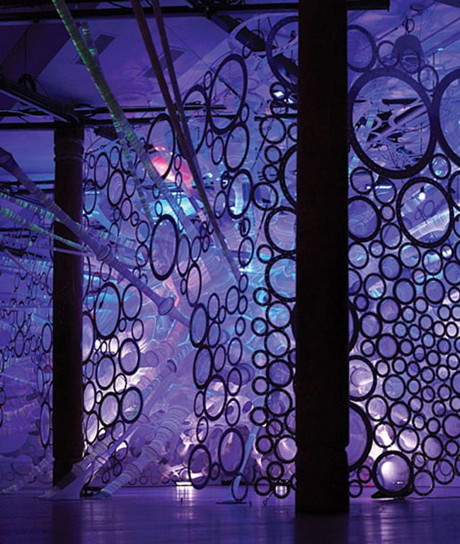 Day to evening light simulation. The myThread Pavilion features responsive WHOLE- GARMENT knitted solar active, photoluminescent, and reflective yarns. Photos courtesy of Nike, Inc 