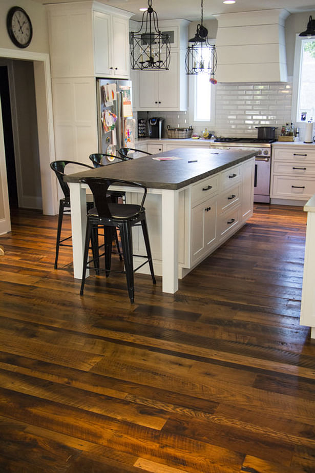 Heartland Barnwood Skip Planed Flooring in Lexington, Kentucky. Visit https://www.oldworldtimber.com/.